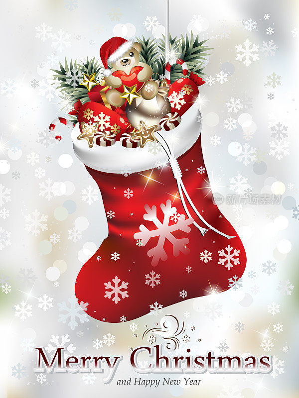 挂圣诞袜与许多糖果和装饰品前的去聚焦的灯与飘落的雪花