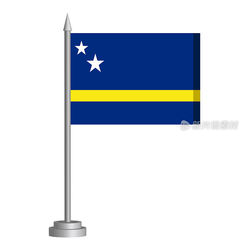 桌上立着旗杆上飘扬的库拉索岛国旗