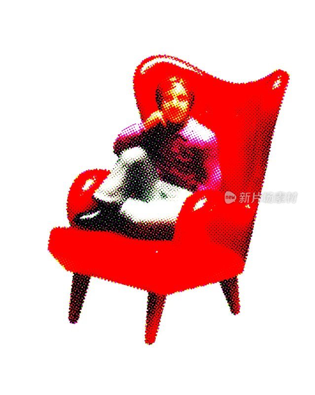 坐在红色大椅子上的男人