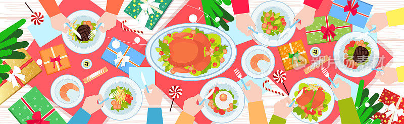 手握叉和刀吃食物，在圣诞节，新年晚餐桌上，烤鸭和配菜，冬季节日庆祝概念上角度看横旗