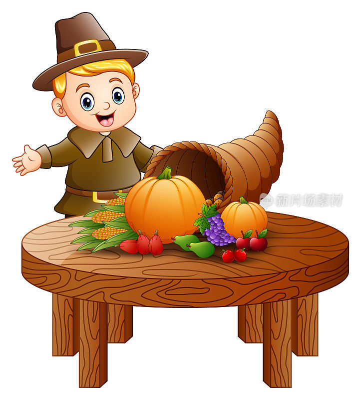 朝圣者的男孩与丰富的水果和蔬菜在圆桌木桌上