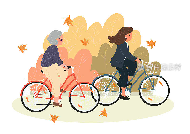 秋天。年轻和年长的妇女骑自行车