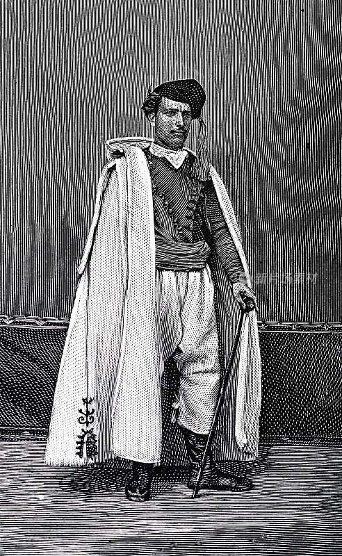 克里特岛，一个人在斯法基亚的肖像穿着传统服装，长外套