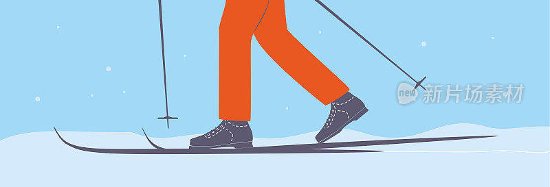 在雪道上拿着滑雪杖的滑雪者。滑雪板。越野滑雪的人。