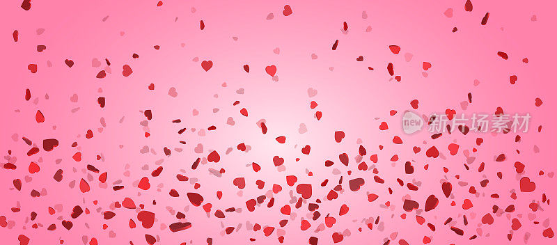 情人节心形纸屑花瓣落在粉红色的背景上。心形的花瓣，用于妇女节