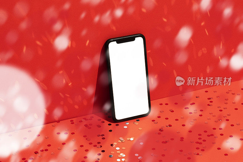智能手机模型，红色背景下的纸屑雨模板