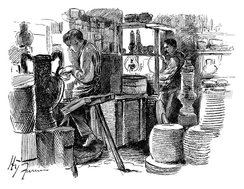 男人们在陶瓷车间工作