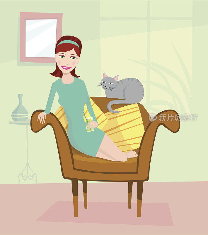 女孩坐在椅子上和猫在家里