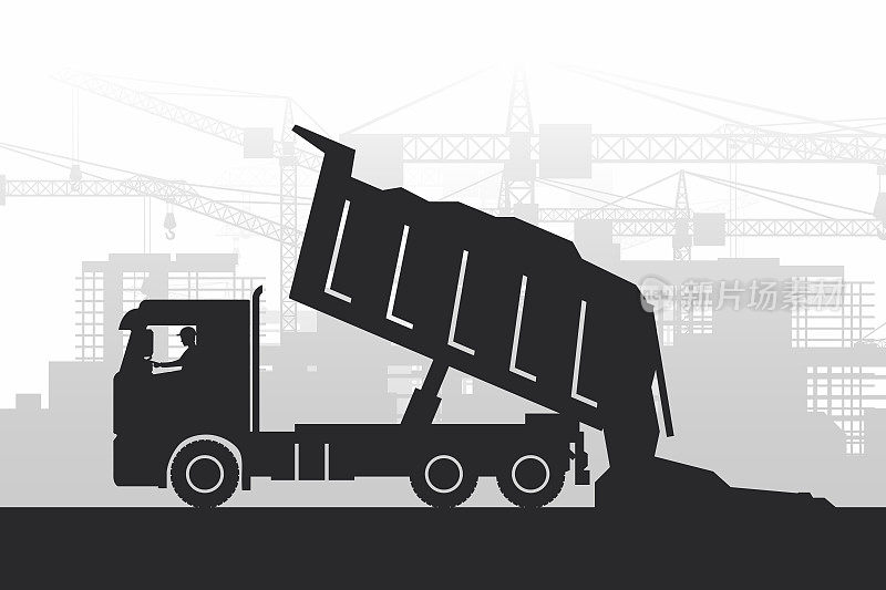 重型机械的剪影，操作工从卡车上卸下建筑材料，背景是正在建设中的城市