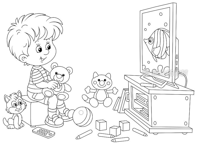快乐的小男孩在玩具中看电视