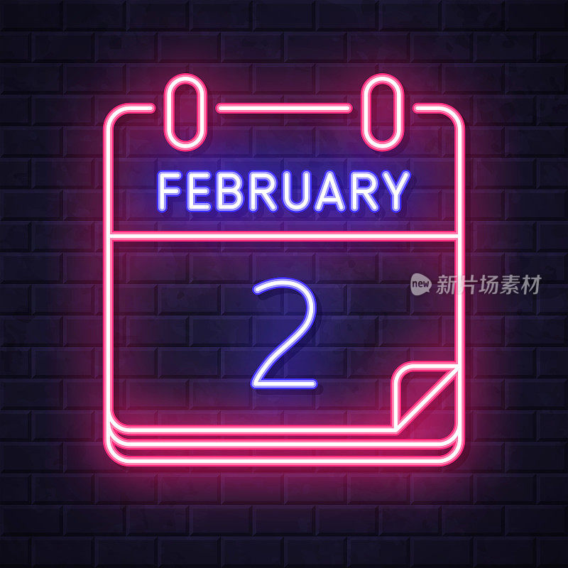 2月2日。在砖墙背景上发光的霓虹灯图标