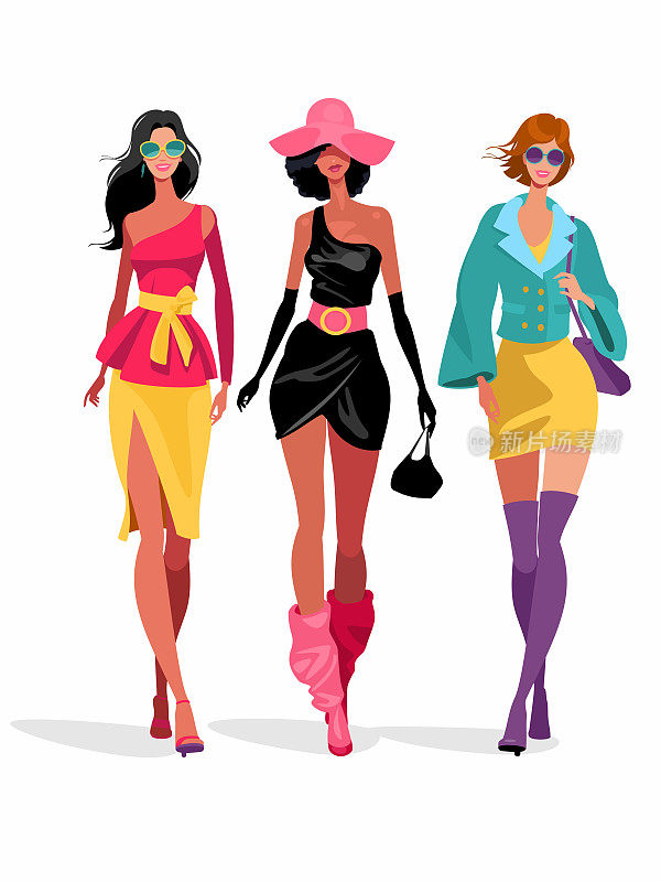 三个穿着时髦衣服的迷人女人走在一起。