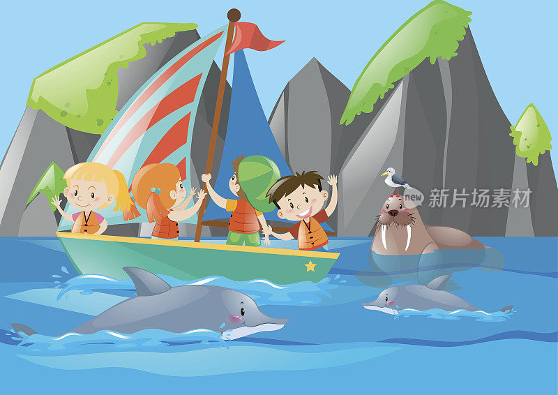 孩子们在船上看海豚