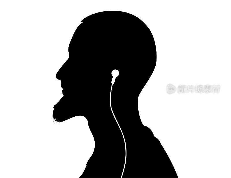 男人戴着耳机听音乐的肖像。