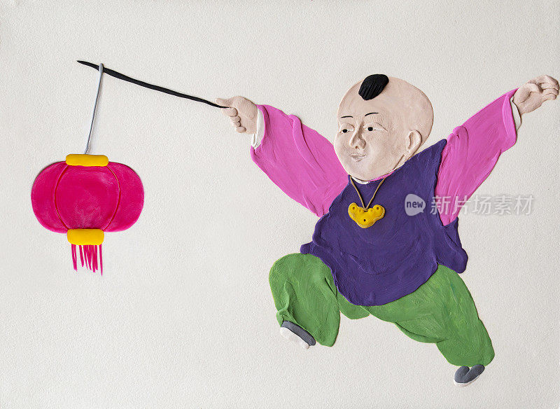 手工泥塑插图:中国的春节装饰品