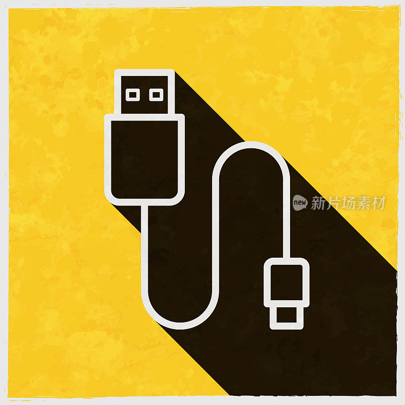 USB电缆。图标与长阴影的纹理黄色背景