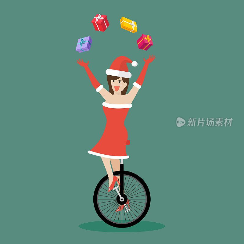 圣诞女孩骑着独轮车摆弄礼品盒