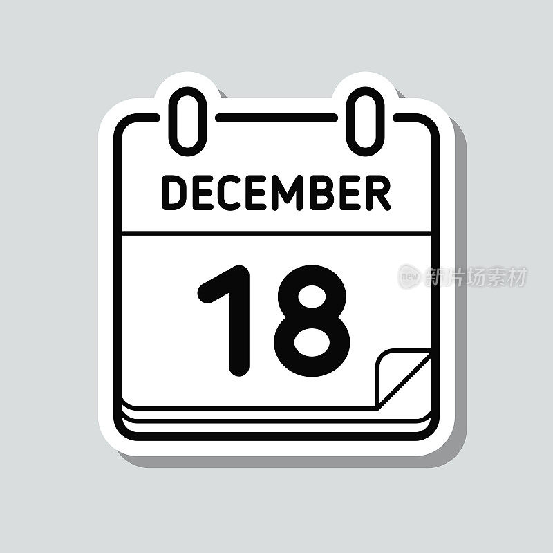 12月18日。灰色背景上的图标贴纸