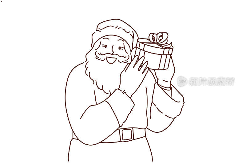 微笑的圣诞老人手里拿着礼物