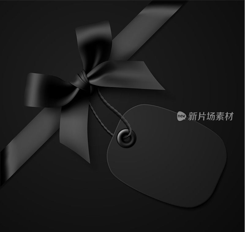 黑色礼品蝴蝶结与黑色标签在黑色背景