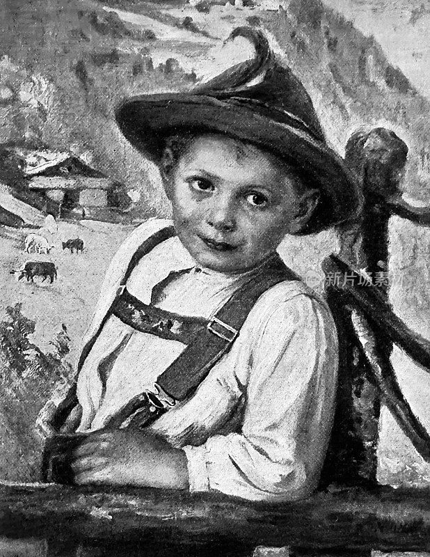 巴伐利亚或奥地利男孩戴蒂洛尔帽子和皮短裤