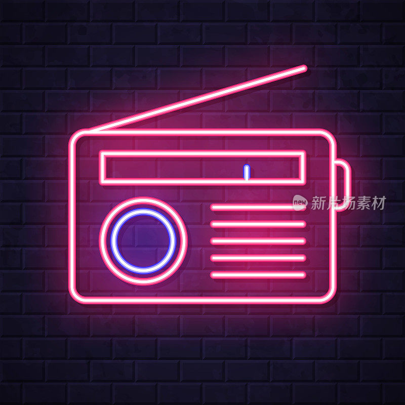 收音机。在砖墙背景上发光的霓虹灯图标
