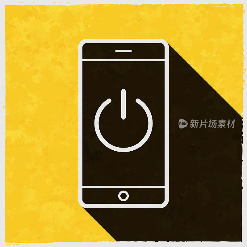 有电源按钮的智能手机。图标与长阴影的纹理黄色背景