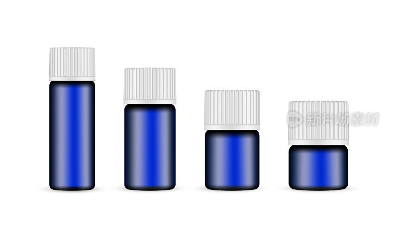不同尺寸的蓝色玻璃医用或化妆品瓶