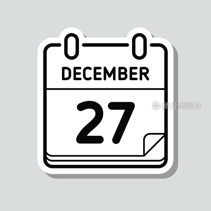 12月27日。灰色背景上的图标贴纸