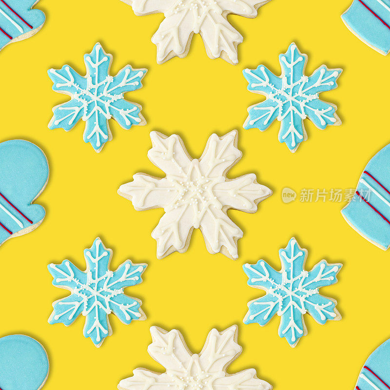 手套，蓝色和白色雪花:圣诞饼干重复图案背景墙纸