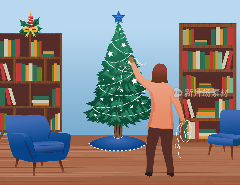 一位妇女正在客厅里装饰圣诞树