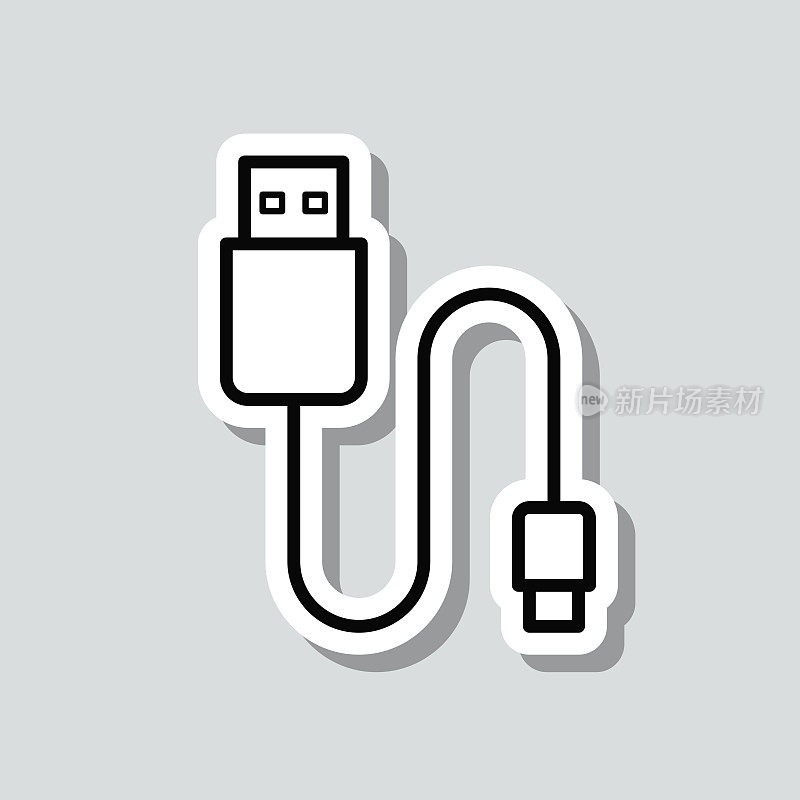 USB电缆。图标贴纸在灰色背景