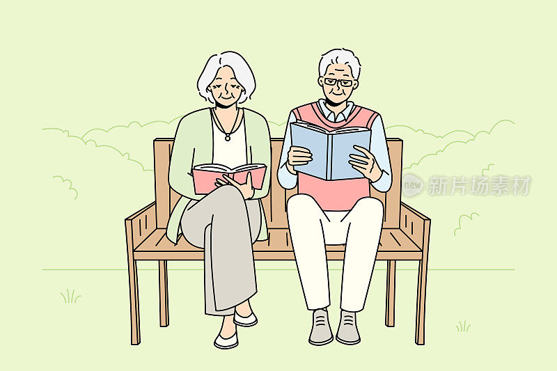 成熟的夫妻坐在长椅上看书