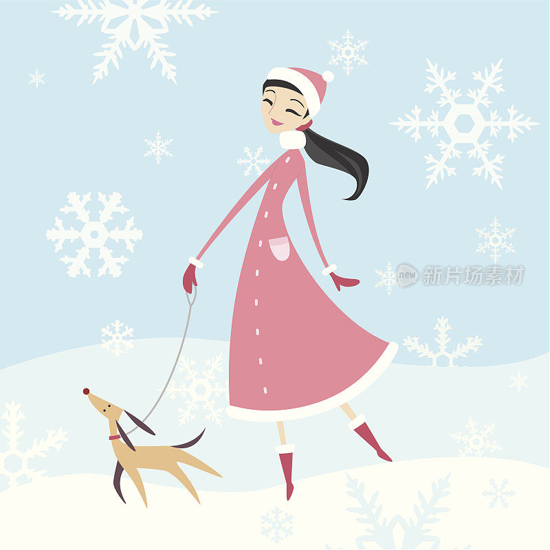 一个女人在冬天遛狗