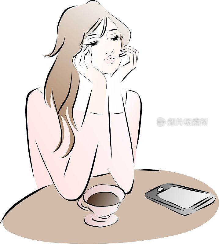 一边喝咖啡一边看手机的女人