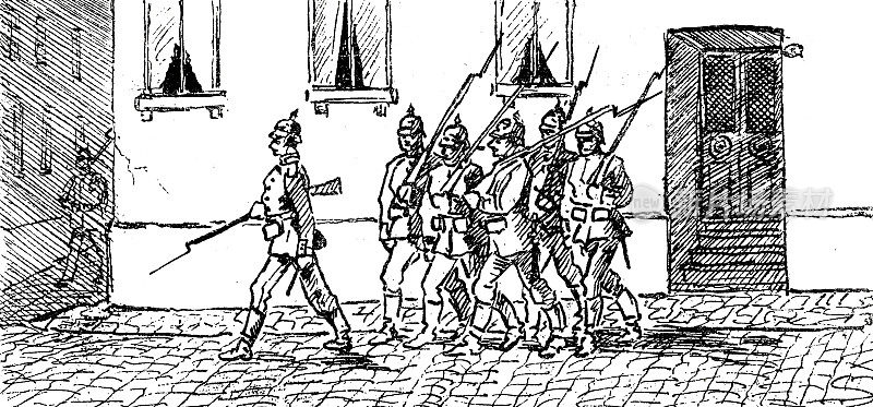 守卫队带着步枪在城里的路上巡逻