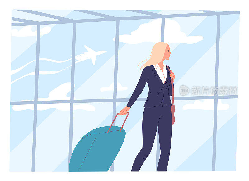 一个年轻女子提着一个手提箱走过机场