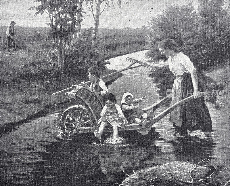 快乐渡江，母亲推着小推车载着孩子们过小溪