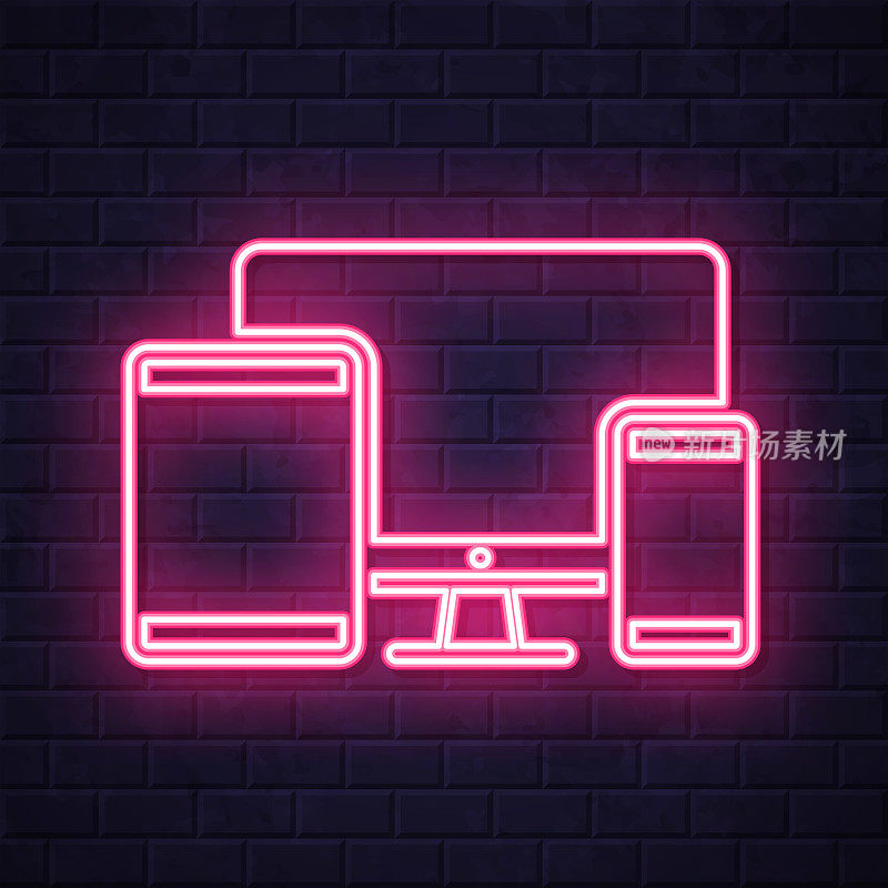 台式电脑、平板电脑和智能手机。在砖墙背景上发光的霓虹灯图标