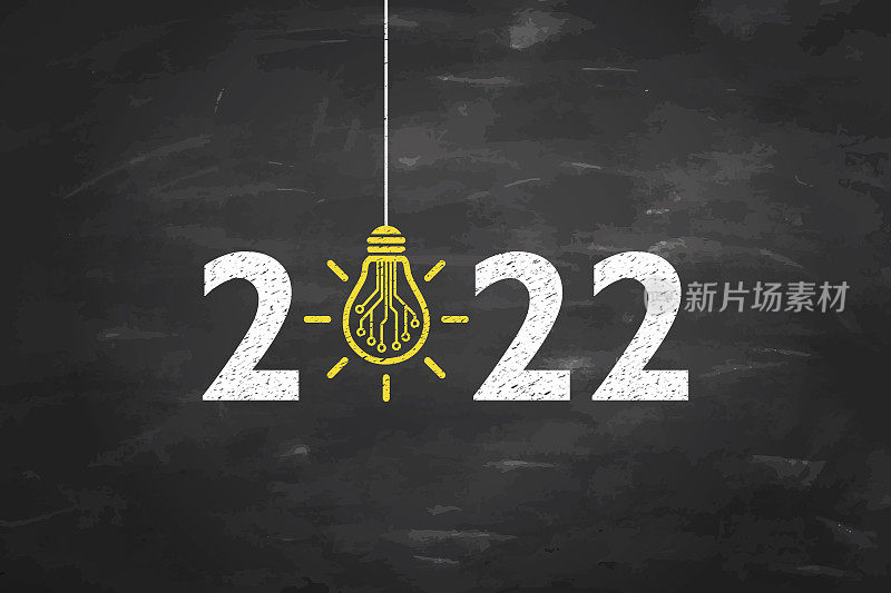 在黑板背景上绘制2022年新年创意概念