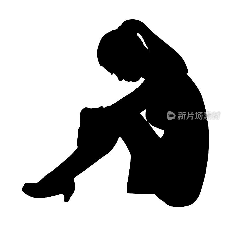 孤独悲伤的女人盘腿坐在地板上，她经历抑郁、压力和悲伤。