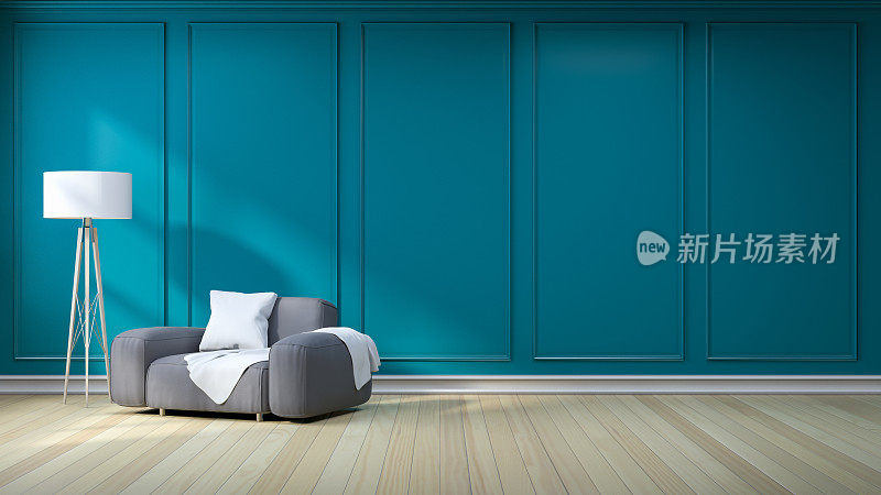极简主义的室内设计，深灰色的沙发与灯在绿色-蓝色的深色墙壁和硬木地板，3d渲染
