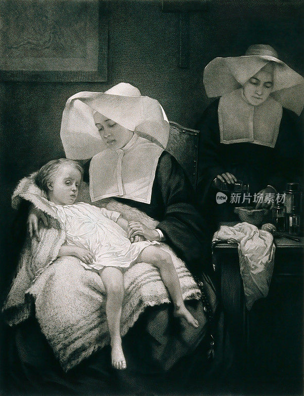 两个修女照顾一个生病的孩子