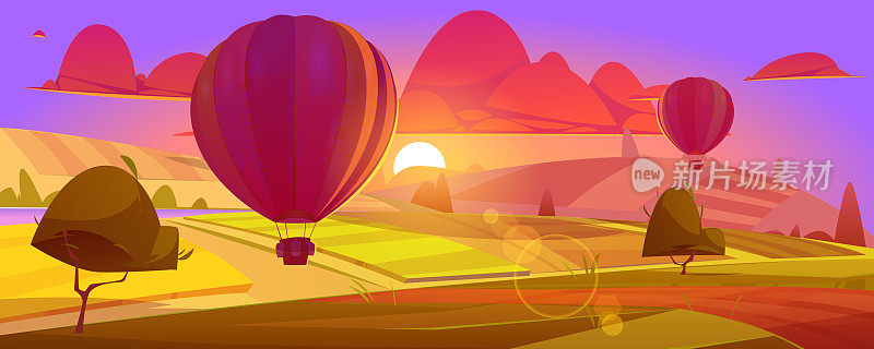 热气球在田野或山谷上空飞行