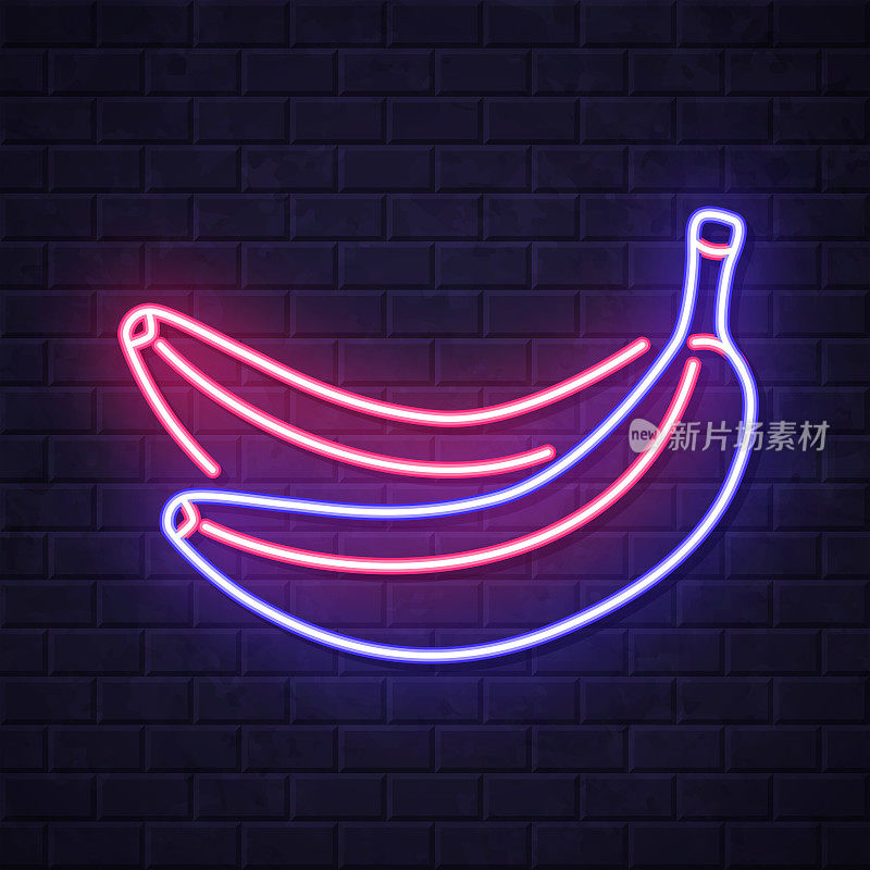 香蕉。在砖墙背景上发光的霓虹灯图标