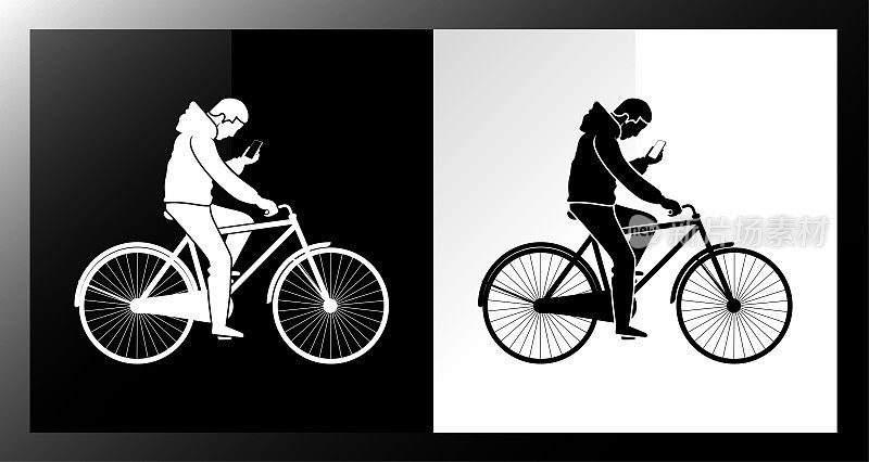 年轻人一边使用智能手机，一边骑自行车