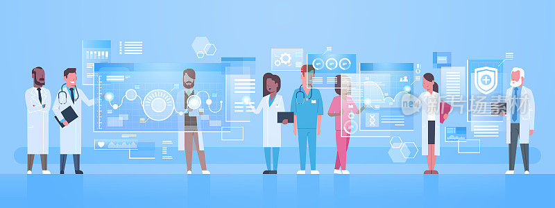 多元化的医生群体使用虚拟电脑屏幕与数字按键创新技术理念现代医疗