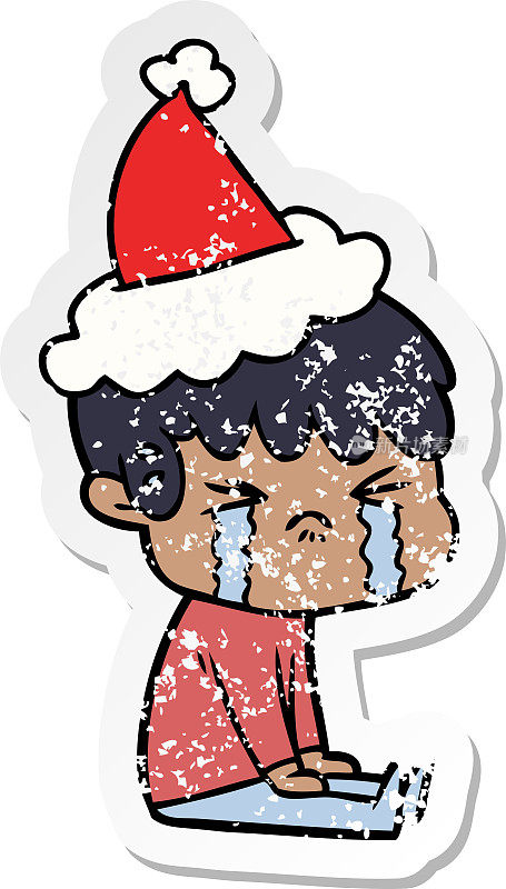 一个男孩戴着圣诞老人的帽子哭泣的手绘心疼贴纸卡通