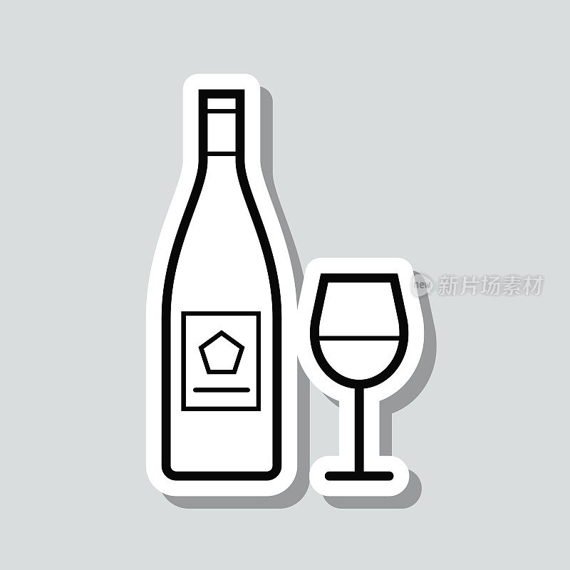 酒瓶和酒杯。灰色背景上的图标贴纸