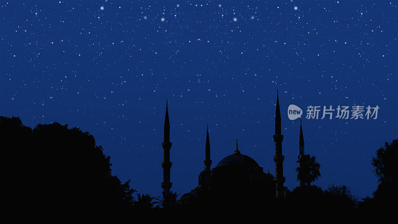 清真寺的剪影与背景模糊的星空夜晚
